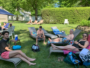 GMSC members relaxing by the pool